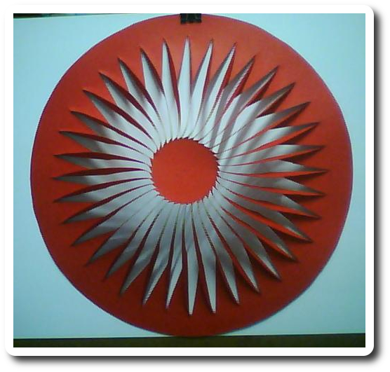 Radial Kirigami Disk